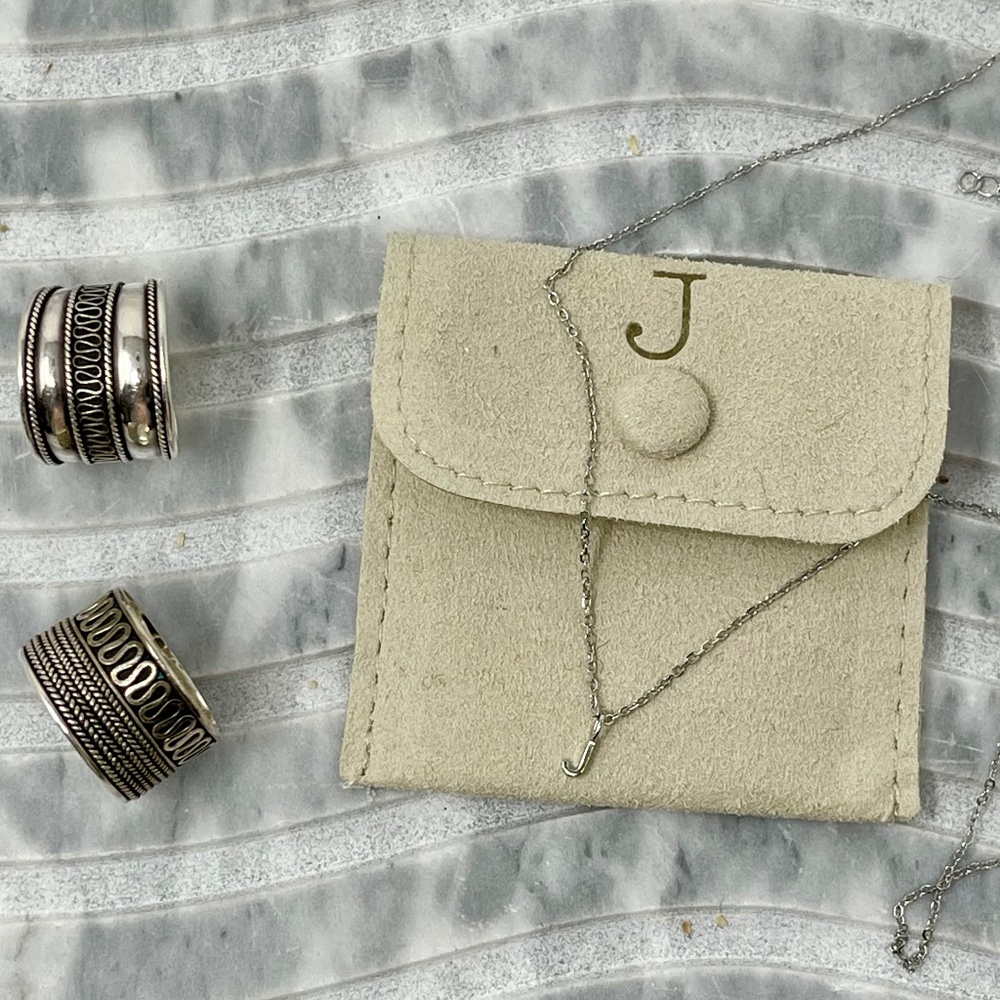 2 rings + "J" initial necklace; 3 items